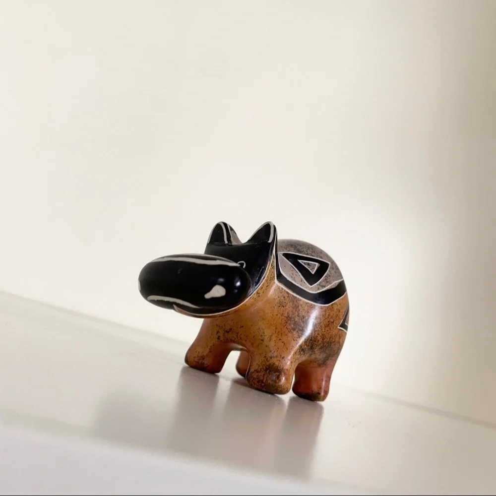 Stone hippo statuette